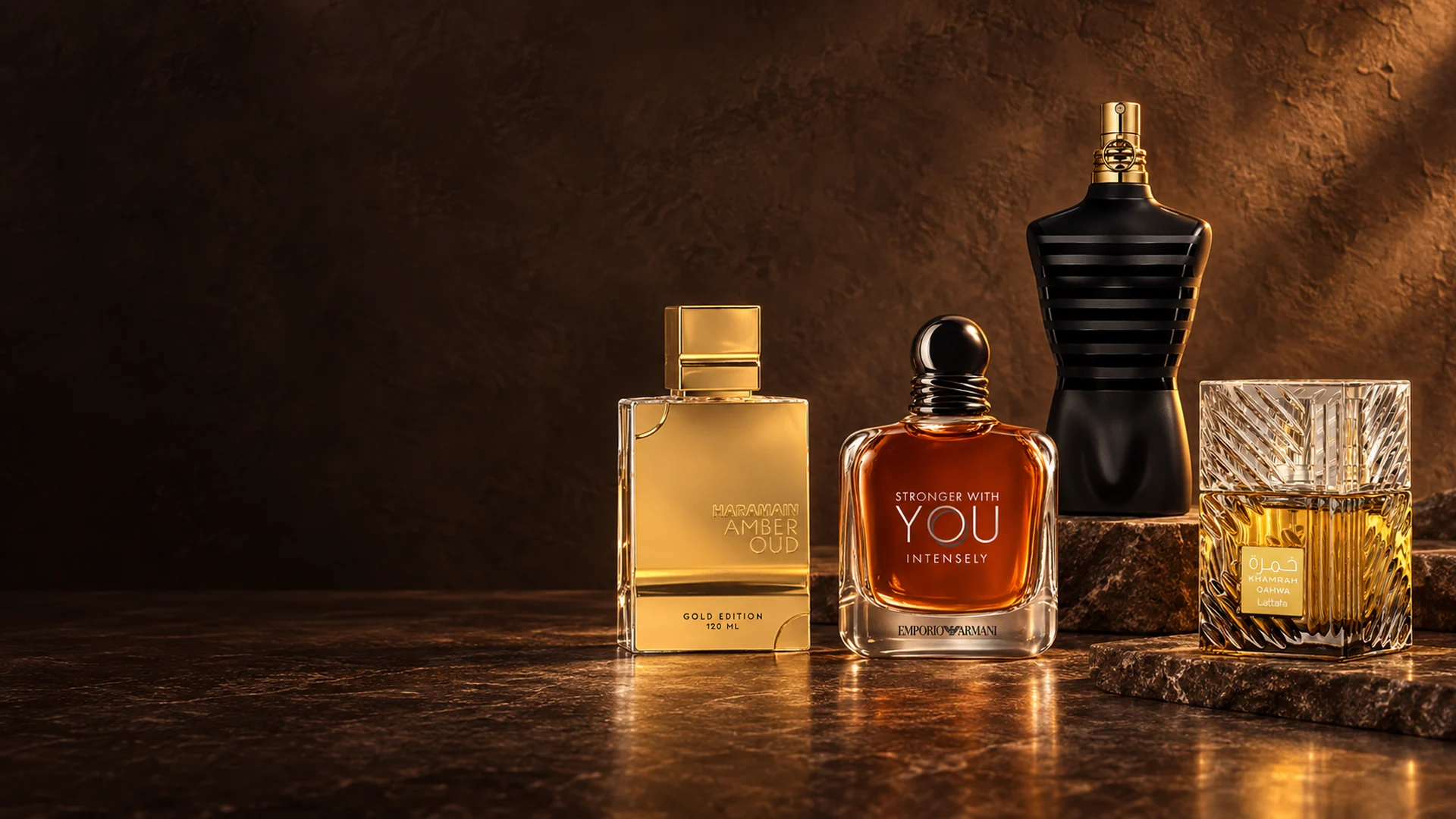 Al Haramain, Emporio Armani, Jean Paul Gaultier and Lattafa fragrances in warm amber light